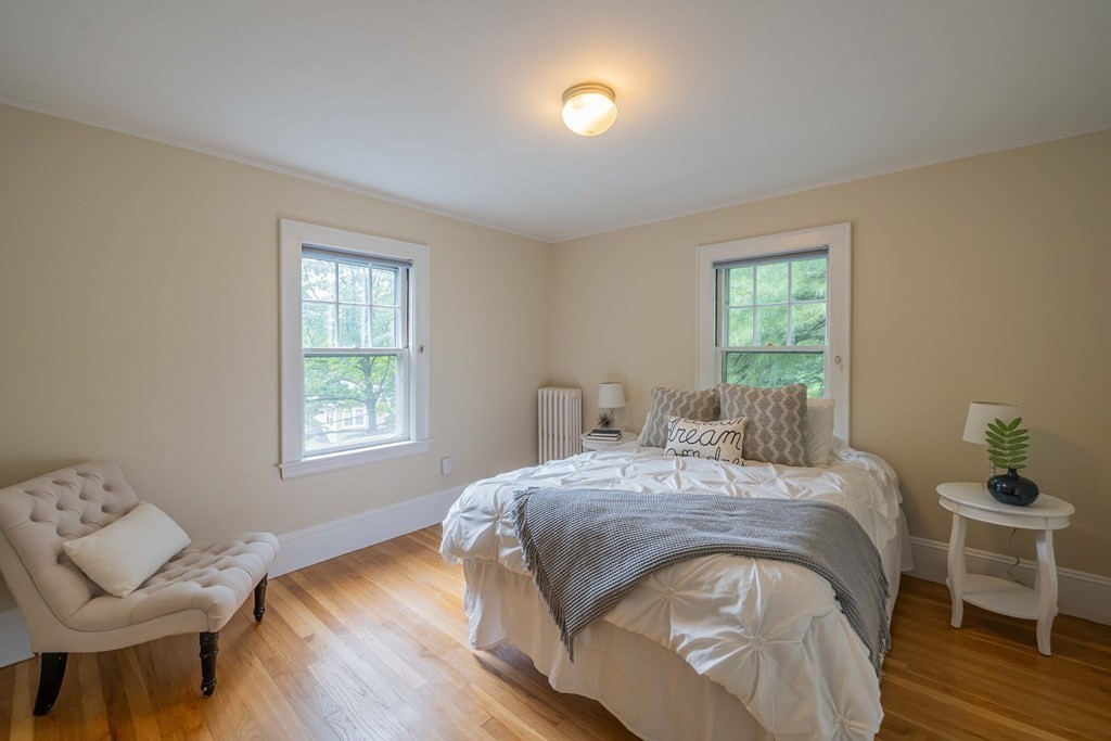11 Wachusett Drive Lexington, MA 02421 - Photo 33 of 42 a bed sitting in a bedroom next to a window