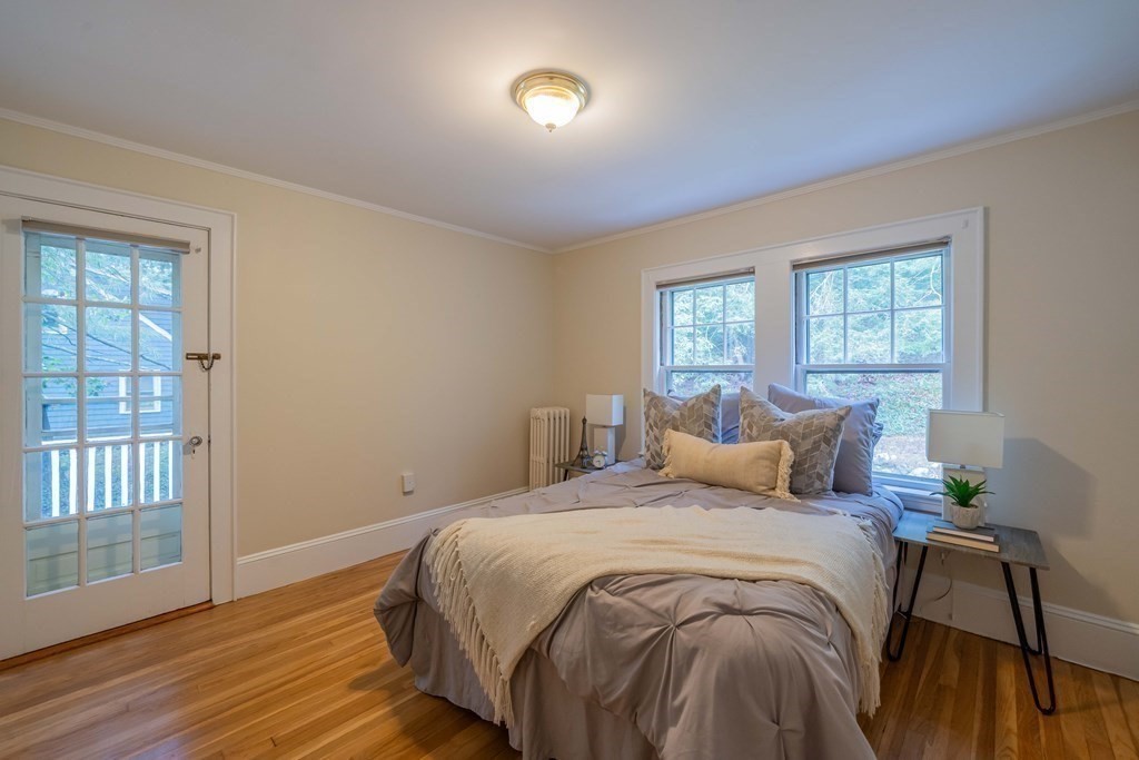 11 Wachusett Drive Lexington, MA 02421 - Photo 36 of 42 a bedroom with a bed and a window