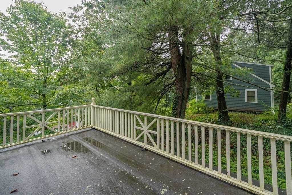 11 Wachusett Drive Lexington, MA 02421 - Photo 38 of 42 a view of balcony with deck and trees