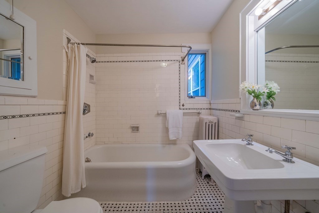 11 Wachusett Drive Lexington, MA 02421 - Photo 39 of 42 a bathroom with a sink a toilet and shower