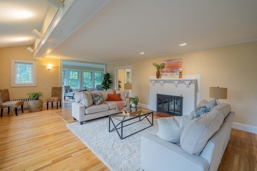 11 Wachusett Drive Lexington, MA 02421 - Photo 5 of 42 a living room with furniture and a fireplace