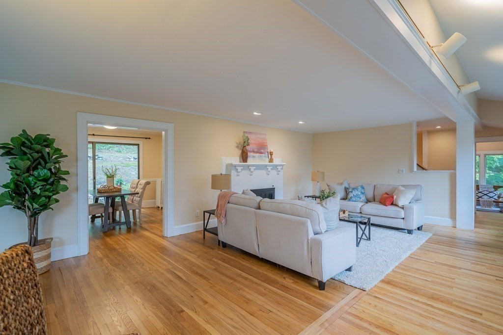 11 Wachusett Drive Lexington, MA 02421 - Photo 9 of 42 a living room with furniture and a wooden floor