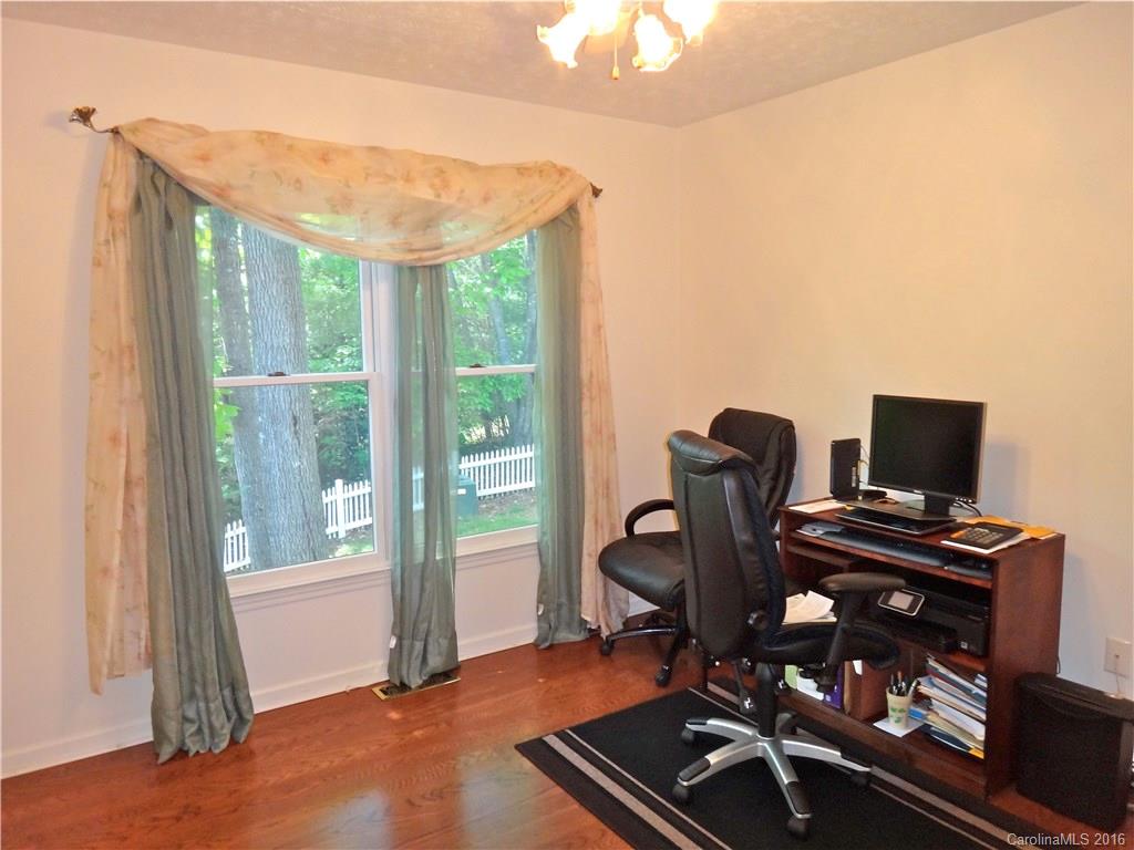 660 Edwards Cove Road, Unit 1 Waynesville, NC 28786 - Photo 15 of 24 a view of a workspace with furniture and a window