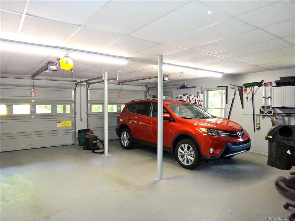 660 Edwards Cove Road, Unit 1 Waynesville, NC 28786 - Photo 20 of 24 a car is parked in a room