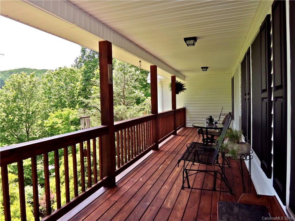 660 Edwards Cove Road, Unit 1 Waynesville, NC 28786 - Photo 22 of 24 a view of balcony with chairs