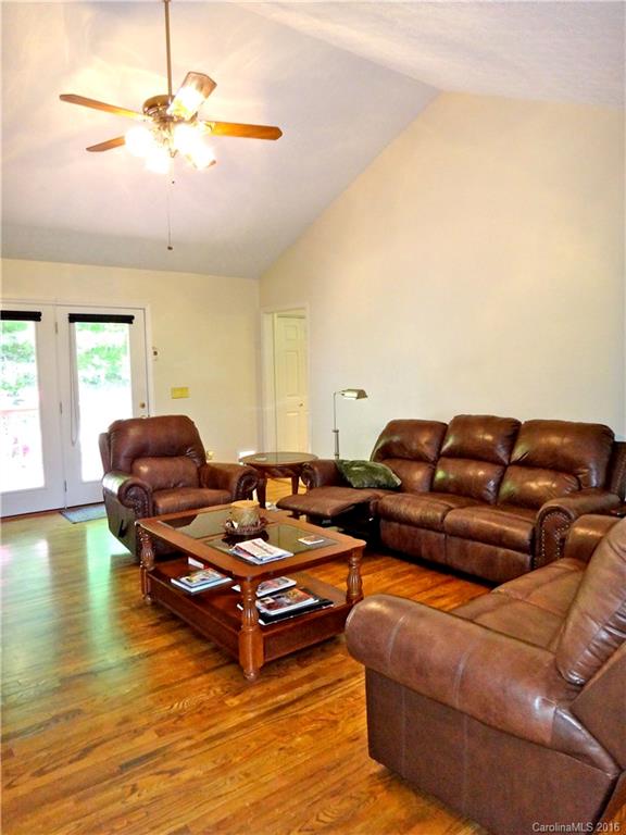 660 Edwards Cove Road, Unit 1 Waynesville, NC 28786 - Photo 6 of 24 a living room with furniture a pool table and chairs