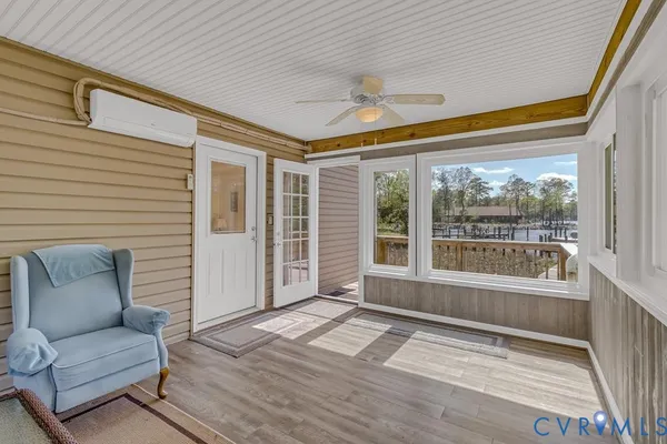 a bedroom with bed and a window