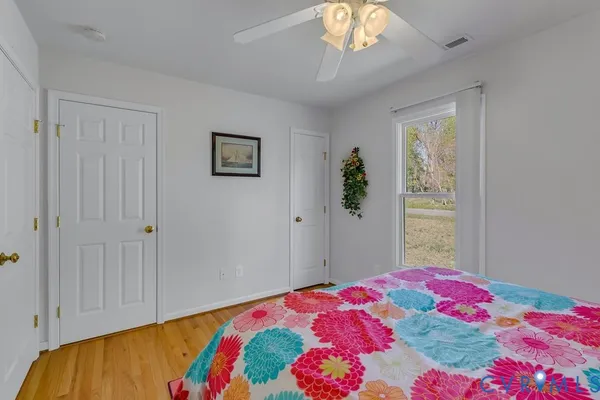 an aerial view of a houses with a lake view