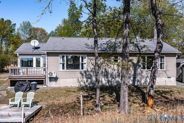 a view of a lake from a balcony with outdoor space