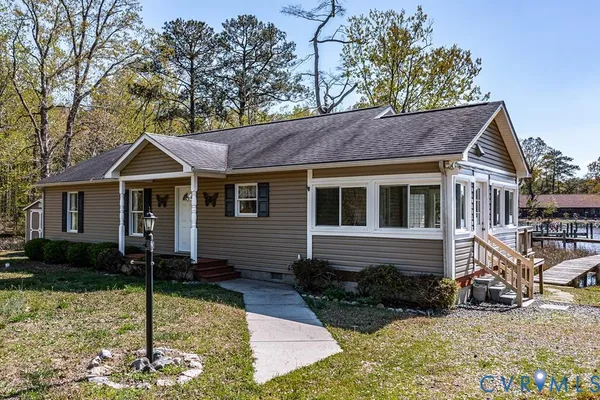 a view of a swimming pool with an outdoor space and seating area
