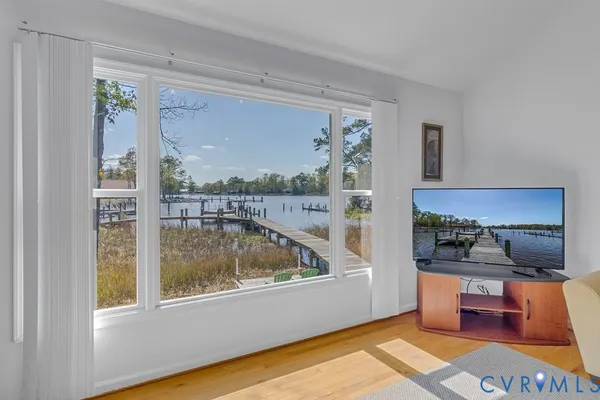 a view of livingroom with furniture and window