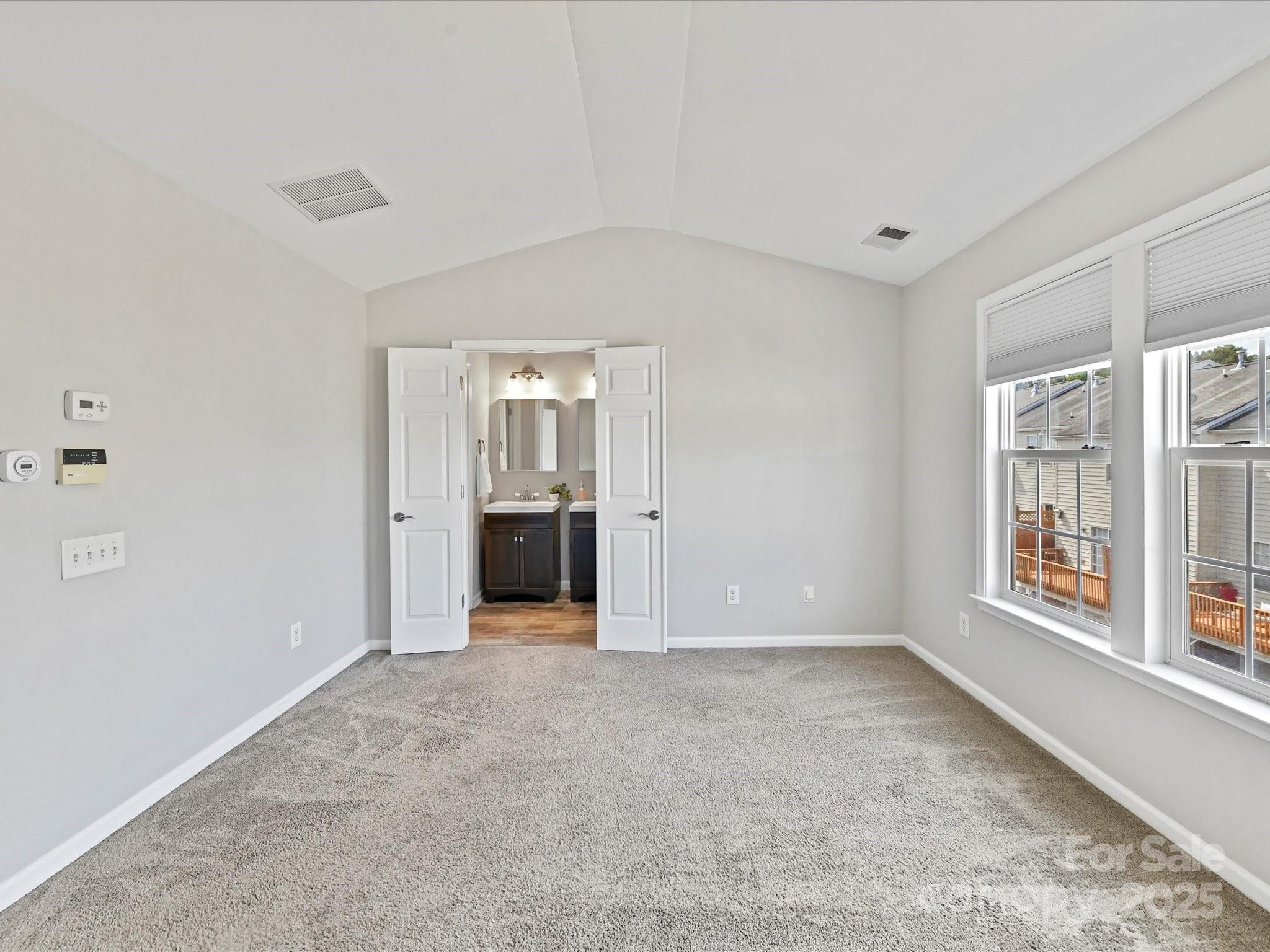 14130 Fitzroy Lane Charlotte, NC 28277 - Photo 16 of 24 wooden floor in an empty room with a window