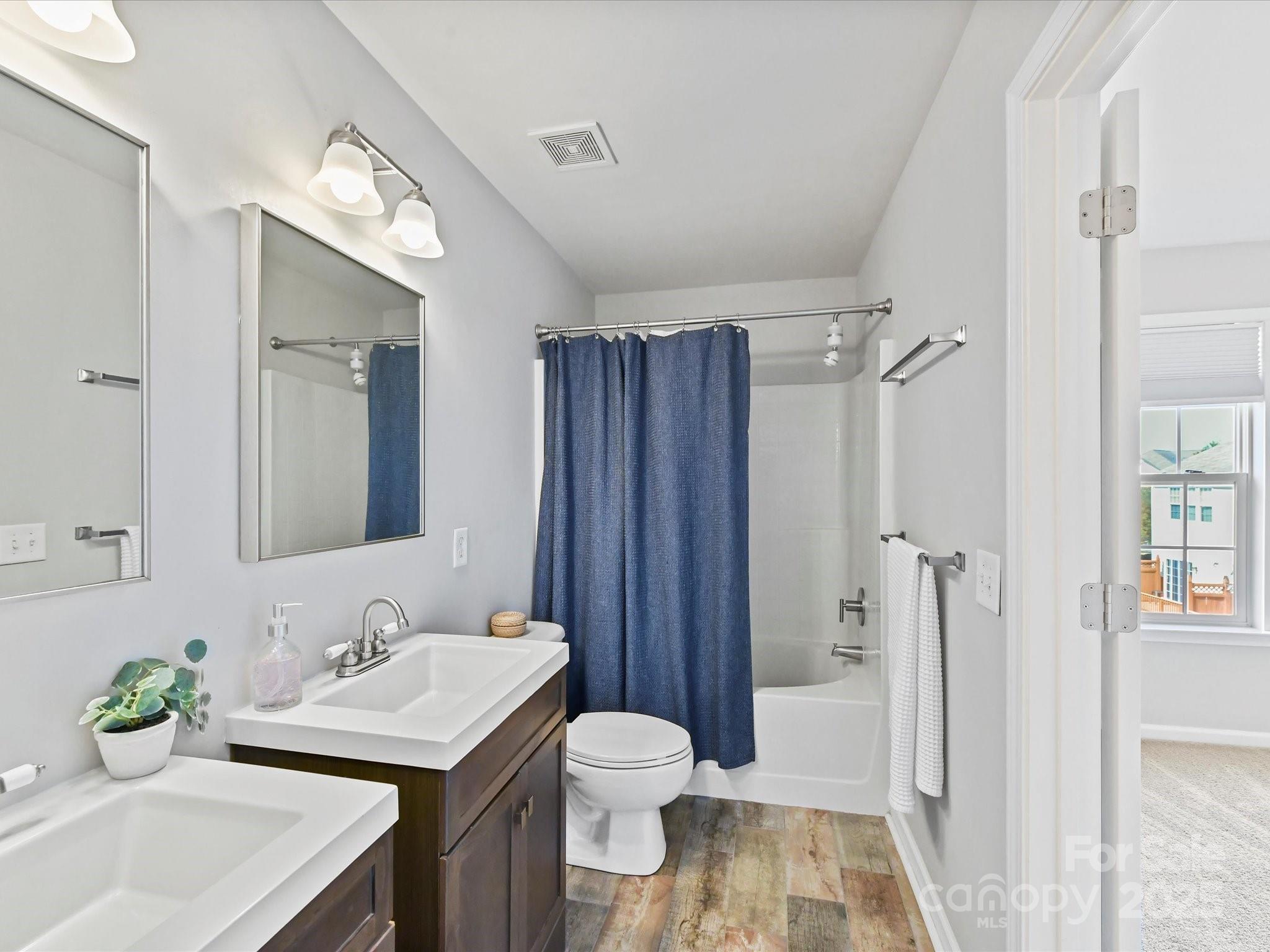 14130 Fitzroy Lane Charlotte, NC 28277 - Photo 18 of 24 a bathroom with a sink toilet and shower