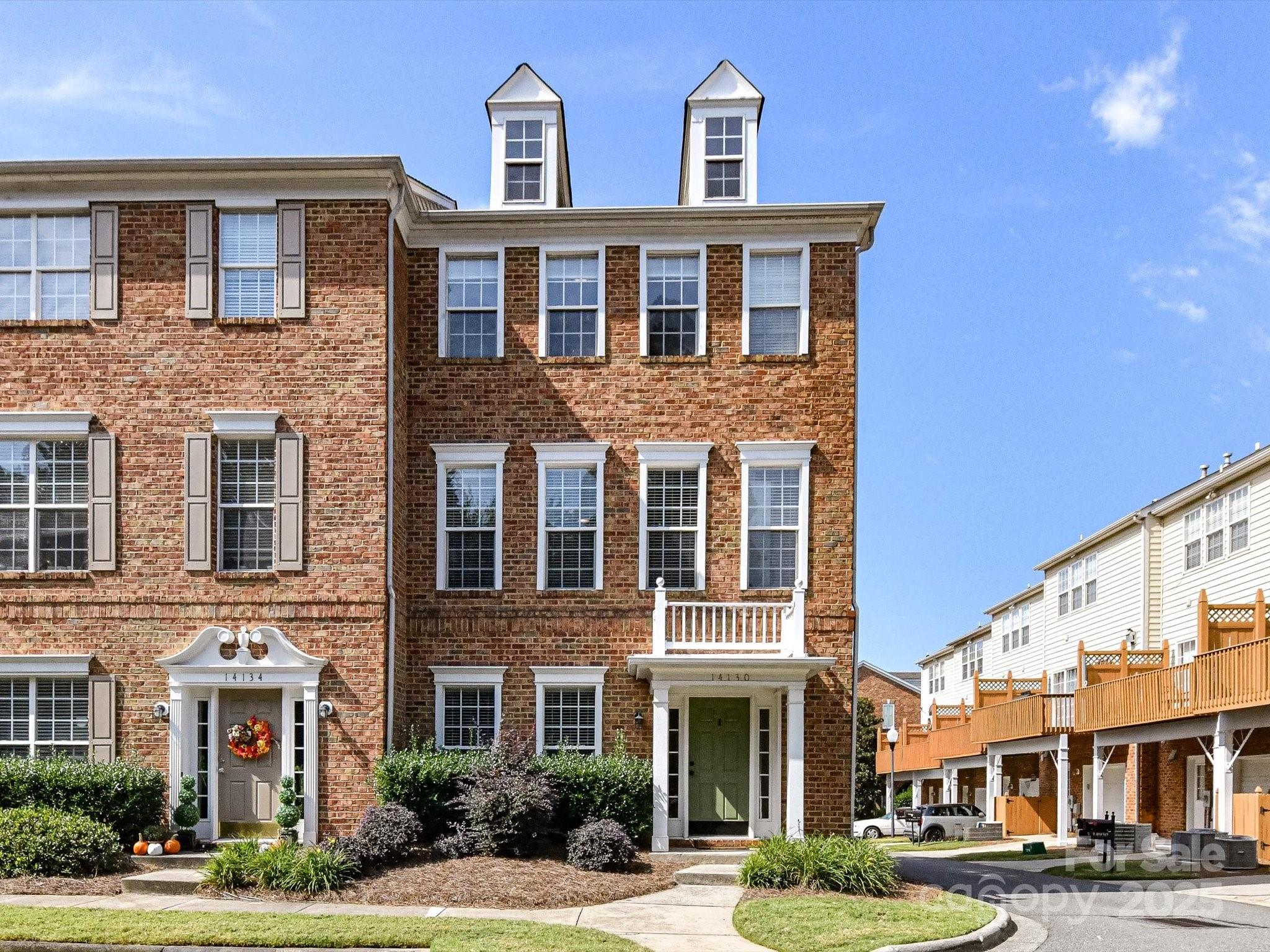 14130 Fitzroy Lane Charlotte, NC 28277 - Photo 2 of 24 a front view of an apartment building