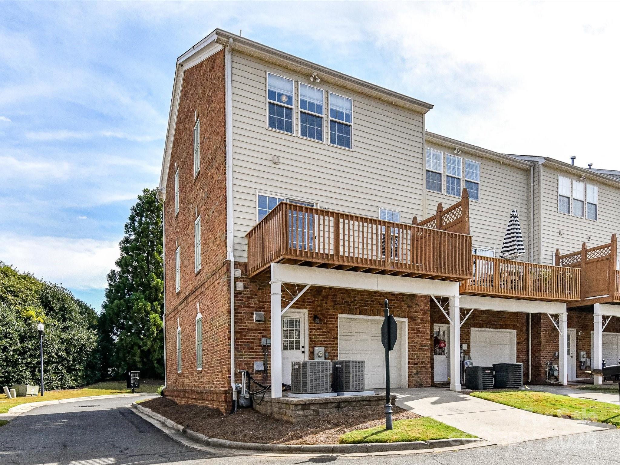14130 Fitzroy Lane Charlotte, NC 28277 - Photo 21 of 24 a front view of a house with garden
