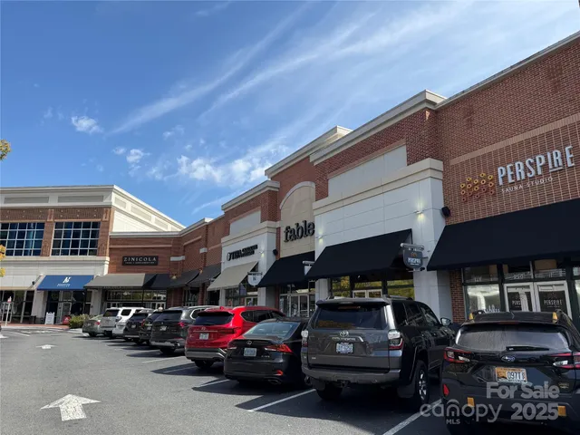 a car parked in front of a building