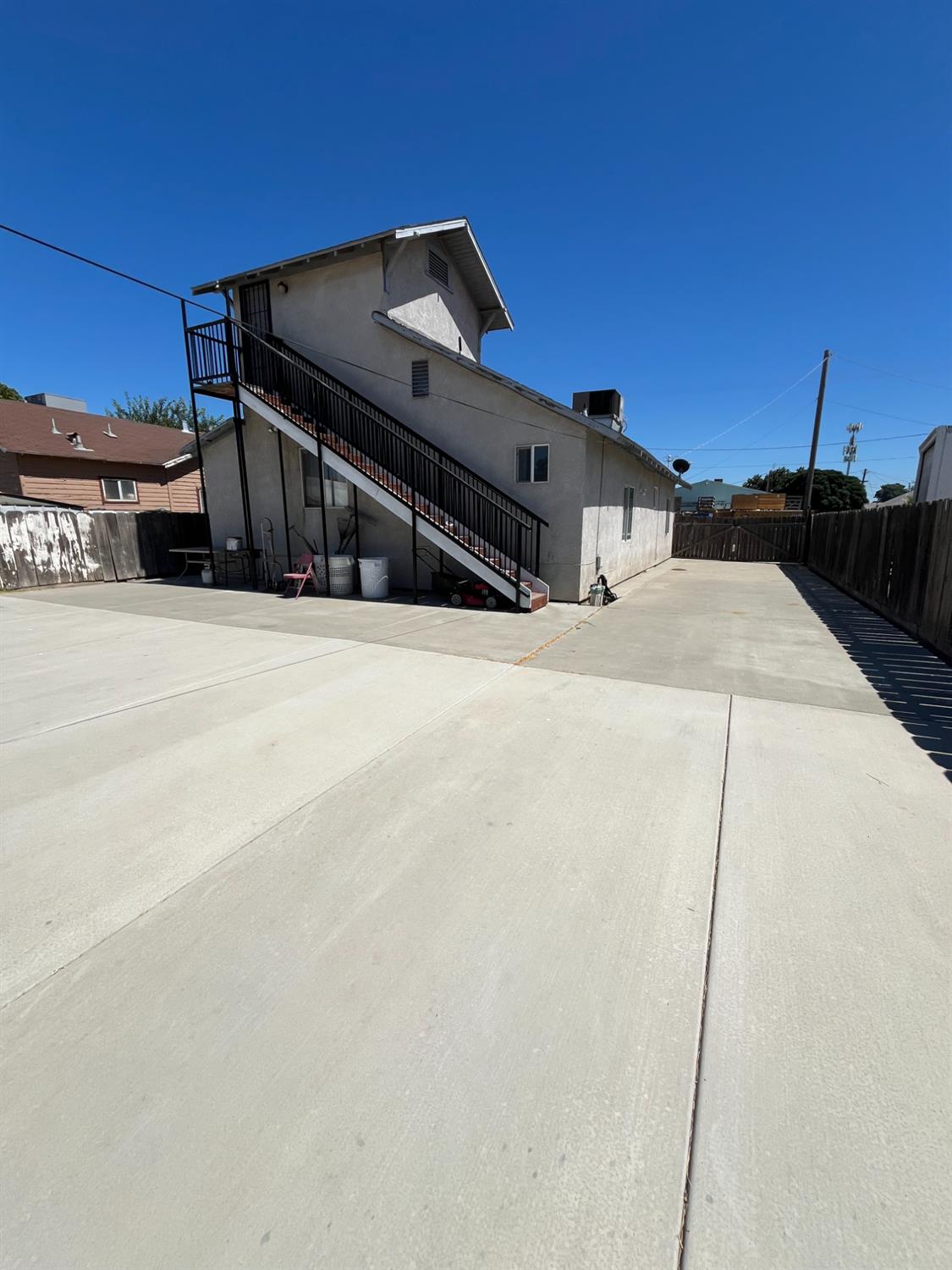 2111 Hackett Road Ceres, CA 95307 - Photo 4 of 9 a front view of a house with a yard