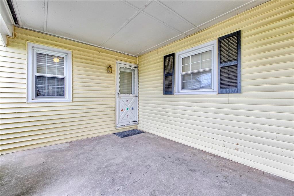 2117 Ridge Road Greensburg, PA 15601 - Photo 4 of 38 a view of a house with a wooden deck