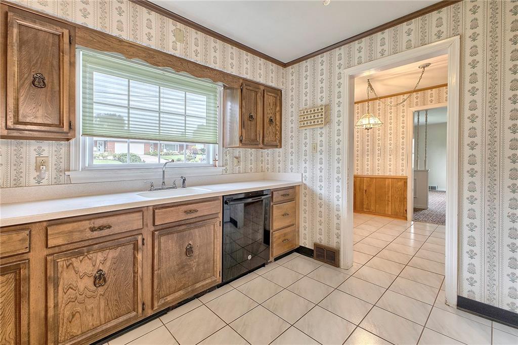 2117 Ridge Road Greensburg, PA 15601 - Photo 10 of 38 a spacious bathroom with a granite countertop sink mirror and a bathtub