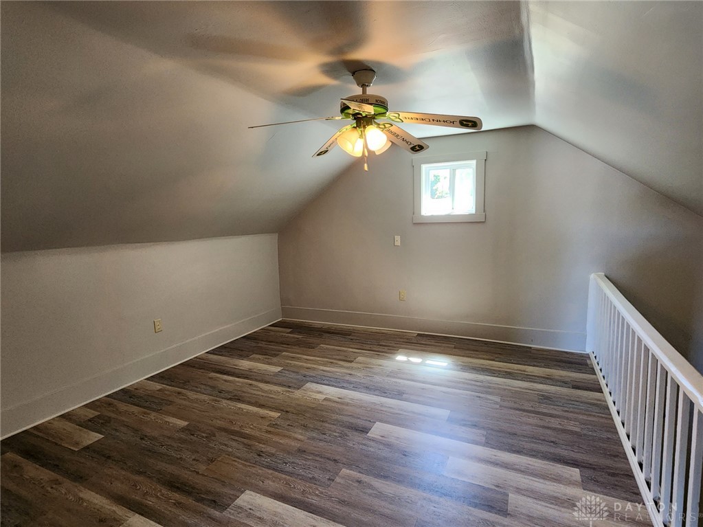 211 Race Street Spring Valley, OH 45370 - Photo 12 of 12 This versatile attic space features vaulted ceilings and rich wood flooring, perfect for a personalized retreat.