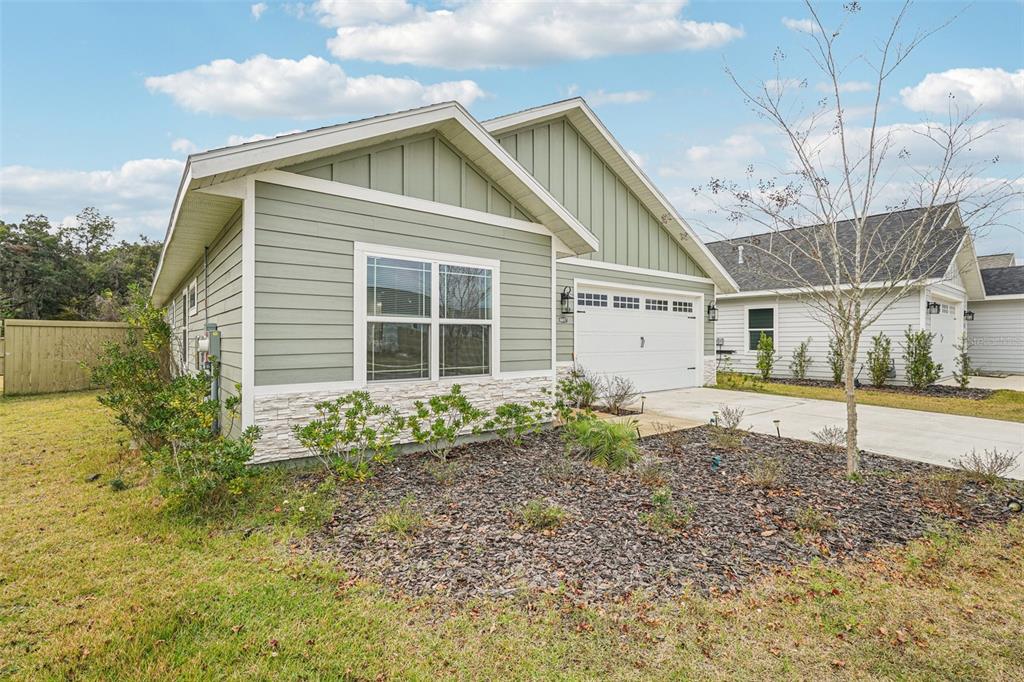 6657 Southwest 15 Place Gainesville, FL 32607 - Photo 3 of 23 a view of a house with a yard