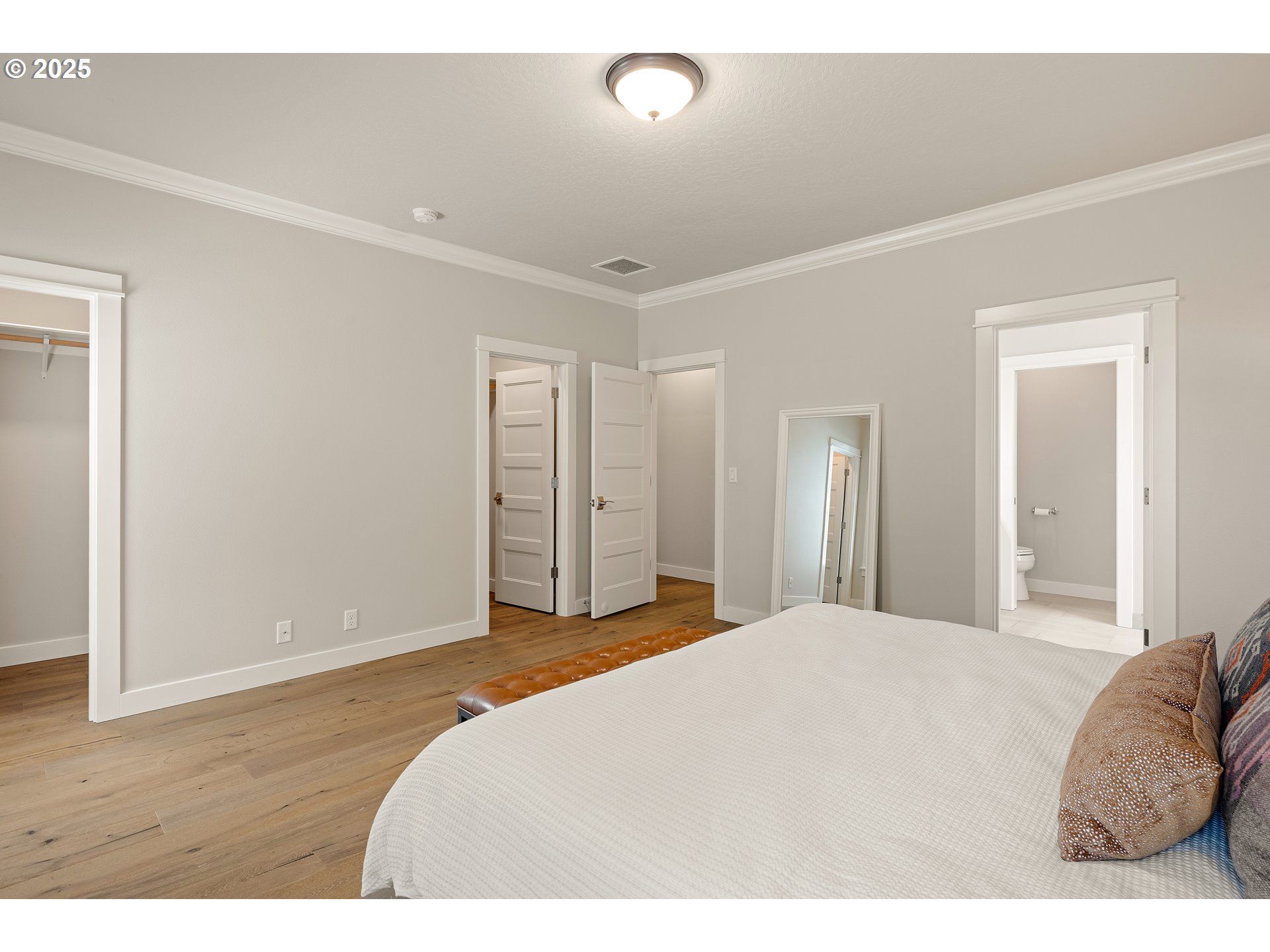 1408 Taylor Street Eugene, OR 97402 - Photo 17 of 43 a bedroom with a bed and a walk in closet