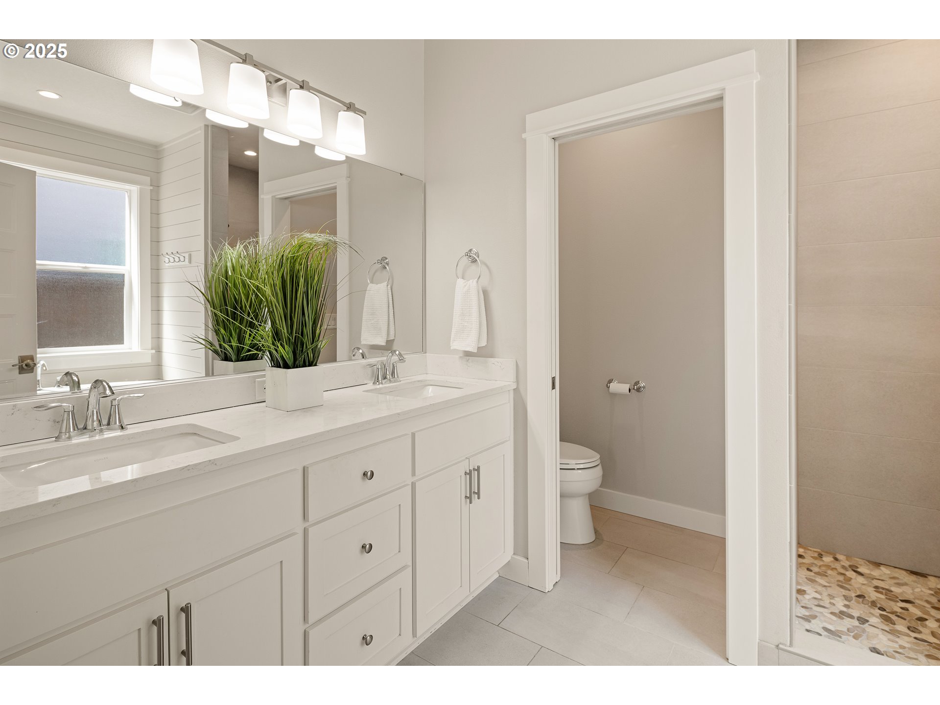 1408 Taylor Street Eugene, OR 97402 - Photo 18 of 43 a bathroom with a granite countertop sink a toilet and a mirror