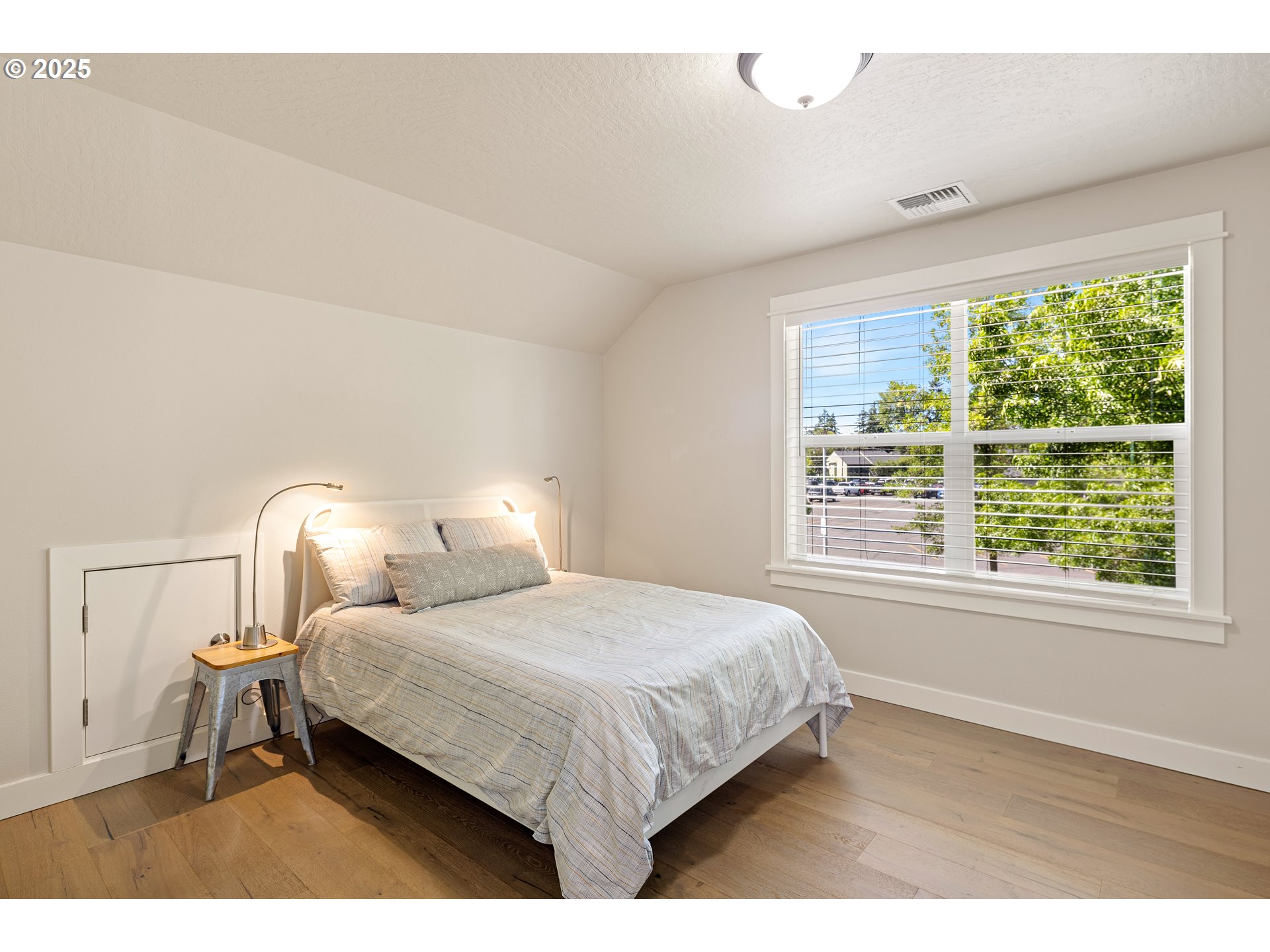 1408 Taylor Street Eugene, OR 97402 - Photo 28 of 43 a bedroom with a bed next to a window