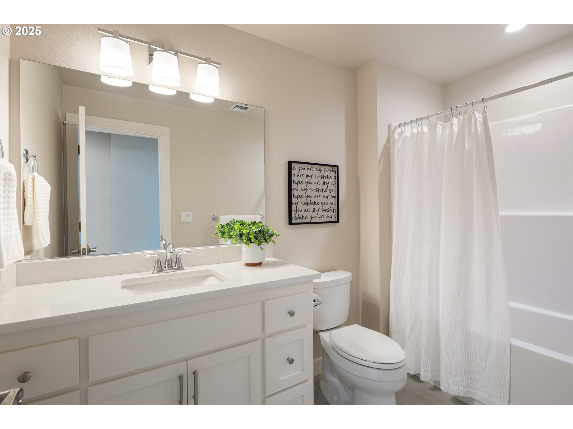 1408 Taylor Street Eugene, OR 97402 - Photo 29 of 43 a bathroom with a sink vanity mirror and toilet