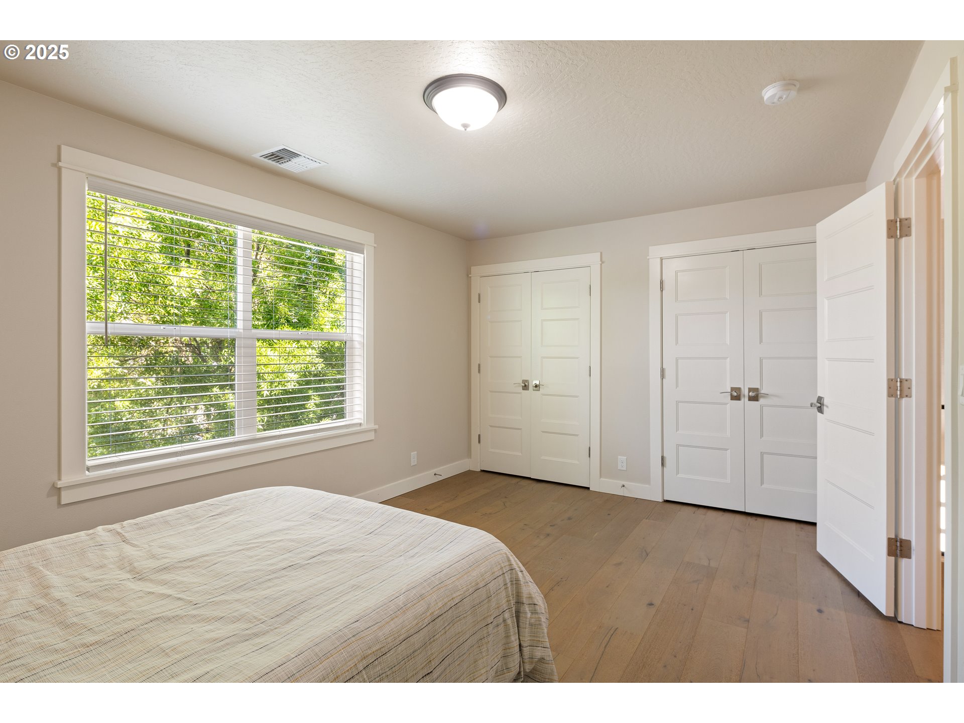 1408 Taylor Street Eugene, OR 97402 - Photo 30 of 43 a bedroom with a bed and a window