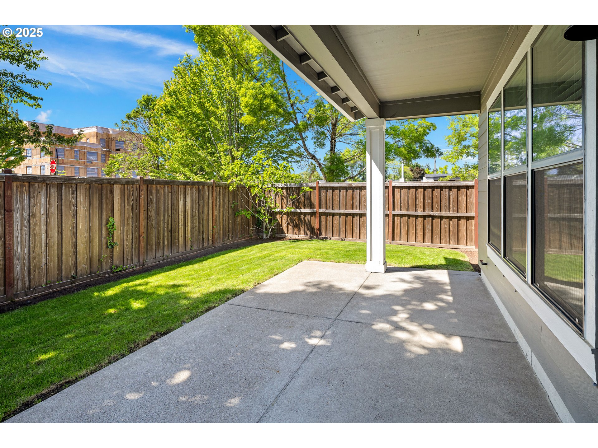 1408 Taylor Street Eugene, OR 97402 - Photo 35 of 43 a view of a backyard with wooden fence