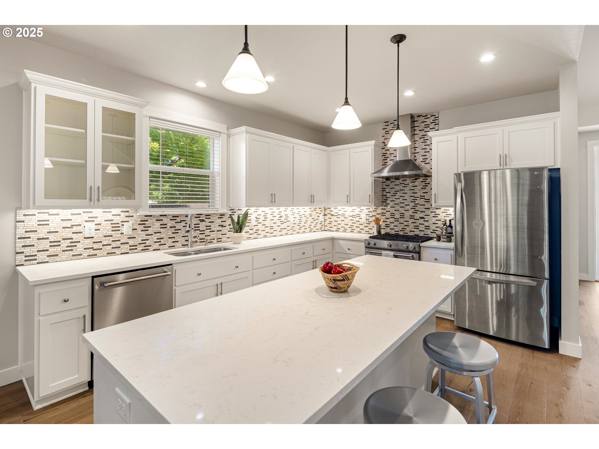 1408 Taylor Street Eugene, OR 97402 - Photo 4 of 43 a kitchen with stainless steel appliances a sink a stove a refrigerator and cabinets