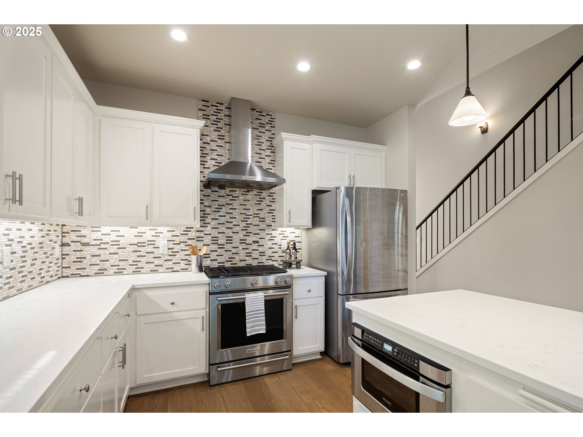 1408 Taylor Street Eugene, OR 97402 - Photo 6 of 43 a kitchen that has a stove a sink and a refrigerator