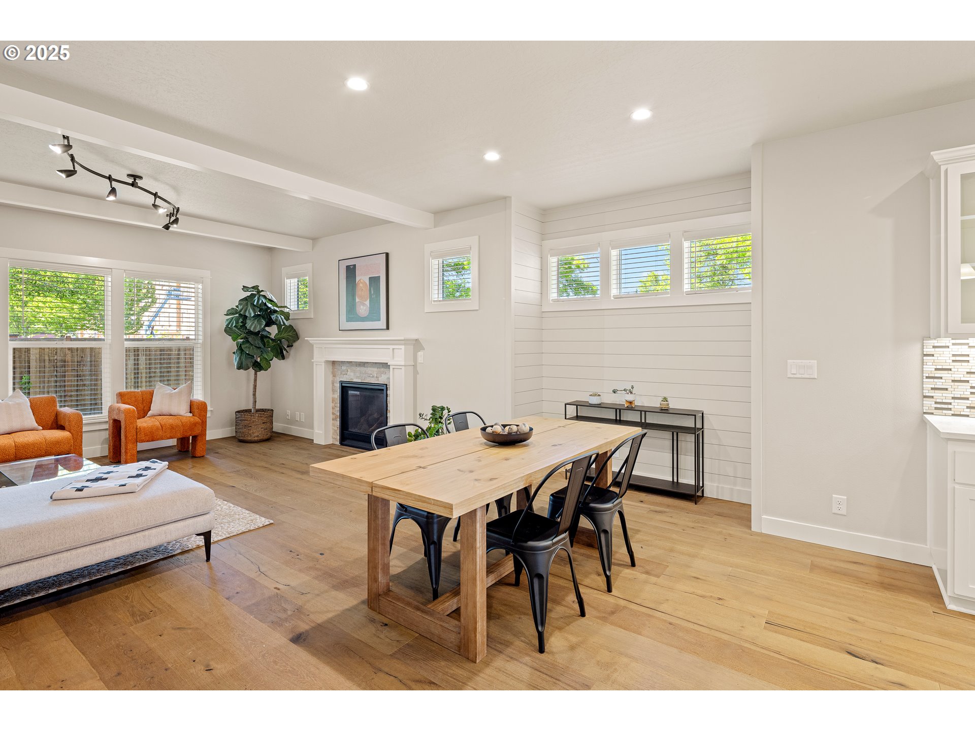 1408 Taylor Street Eugene, OR 97402 - Photo 7 of 43 a view of a dining room with furniture and a fireplace