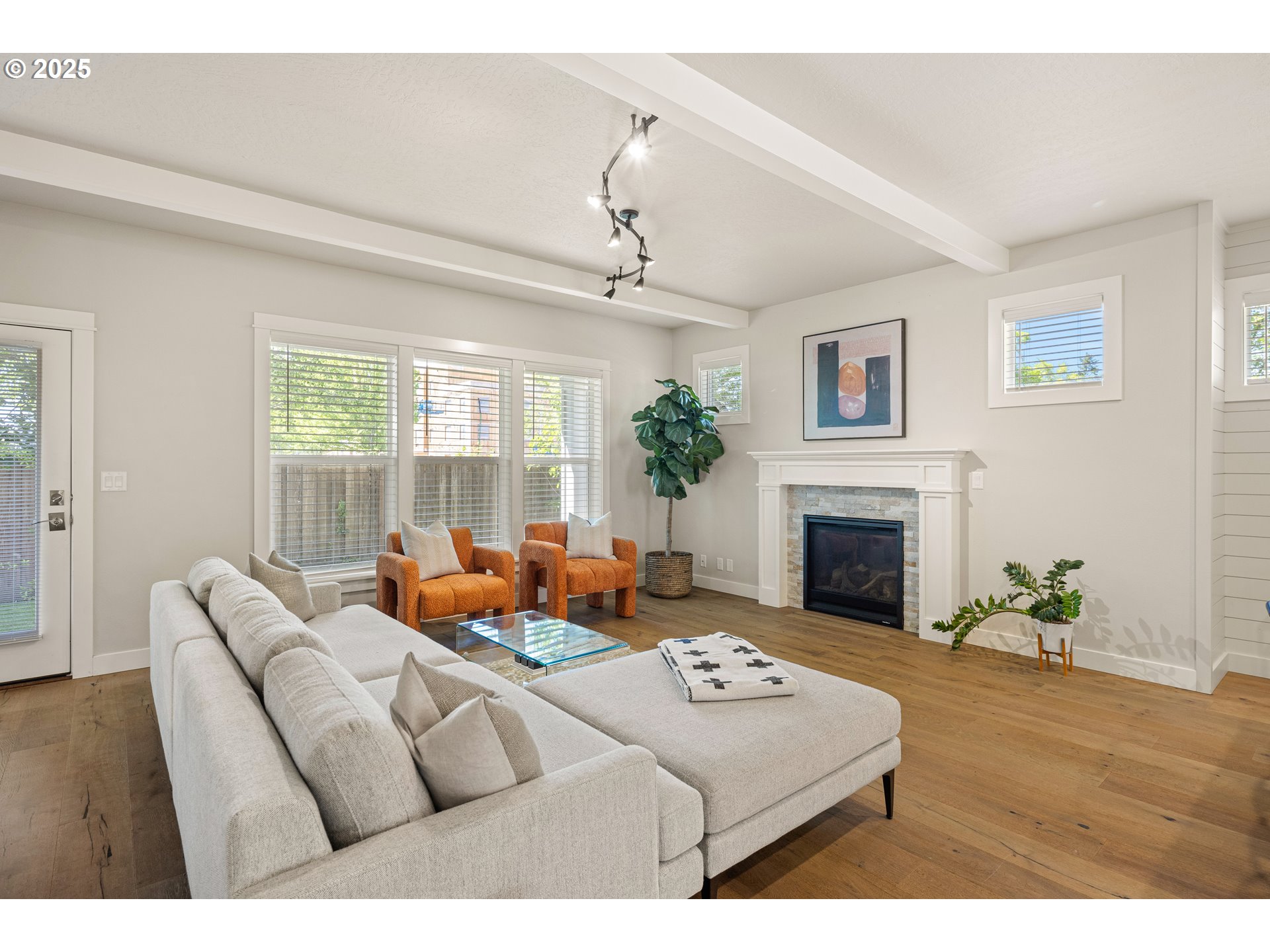 1408 Taylor Street Eugene, OR 97402 - Photo 8 of 43 a living room with furniture a fireplace and a window