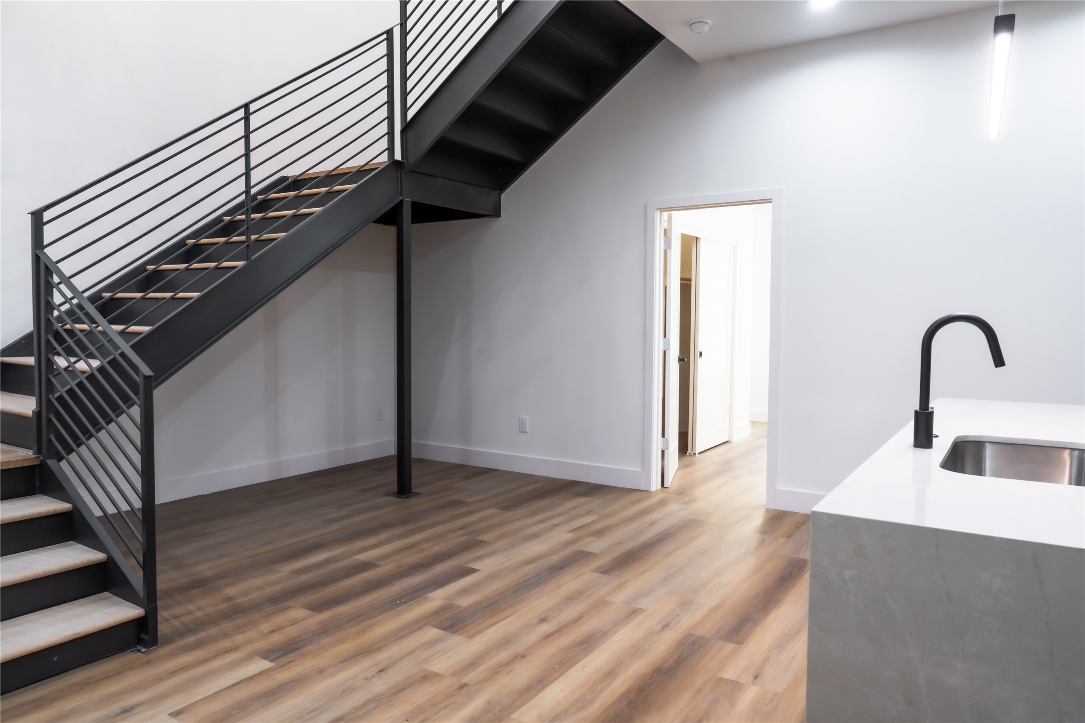 5614 Larkin Street, Unit D Houston, TX 77007 - Photo 13 of 16 a kitchen with a sink and a microwave