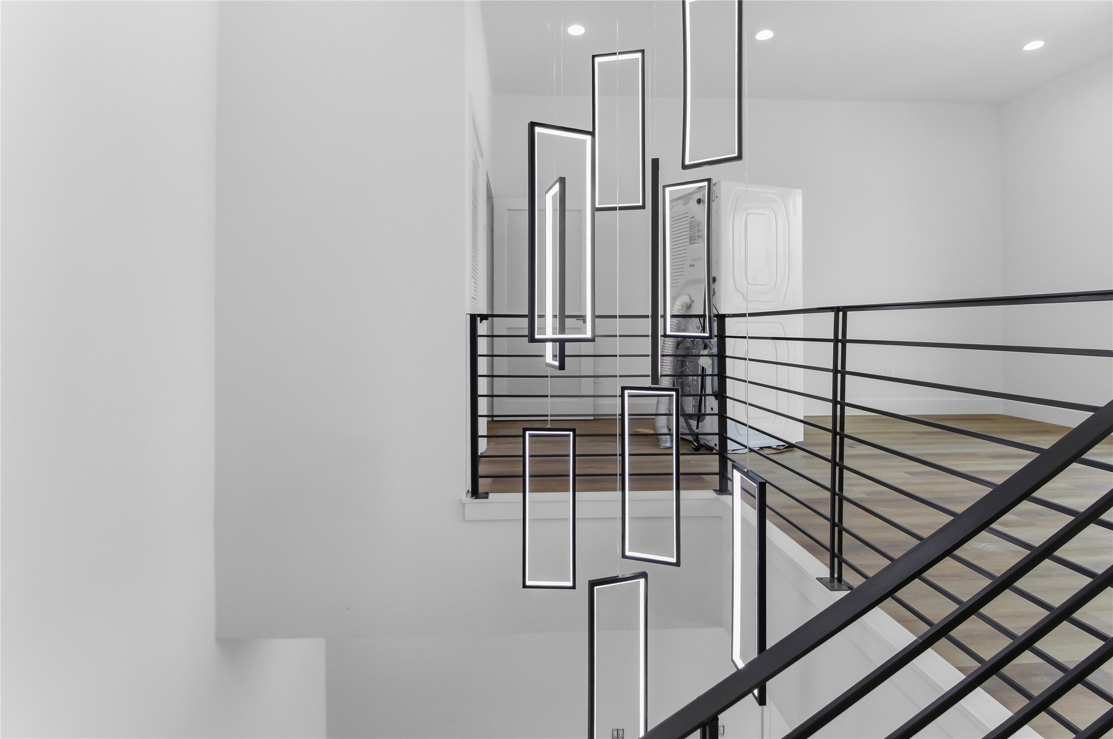 5614 Larkin Street, Unit D Houston, TX 77007 - Photo 9 of 16 a view of staircase with white walls