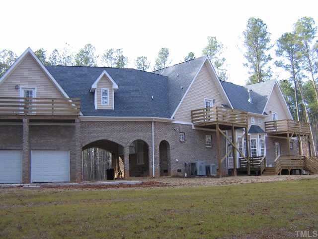 7015 Denlee Road Raleigh, NC 27603 - Photo 3 of 4 a front view of house with yard