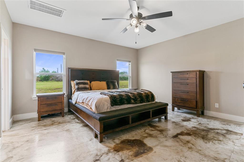 139 Kriston Lane Springtown, TX 76082 - Photo 22 of 39 Spacious room featuring light-colored walls and a vaulted ceiling