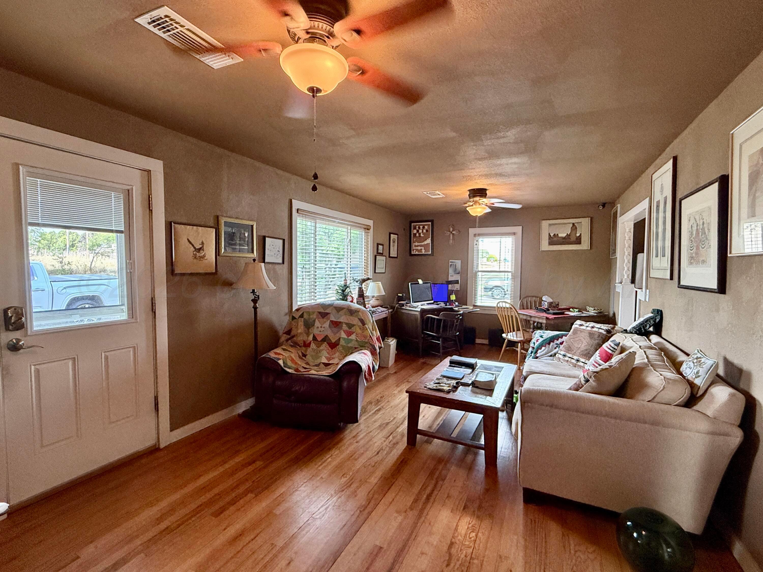 701 Brain Street Borger, TX 79007 - Photo 9 of 18 a living room with furniture and wooden floor