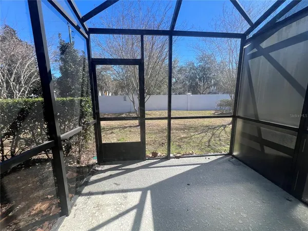 a view of a glass door with a outdoor space