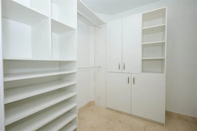a view of an empty walk in closet