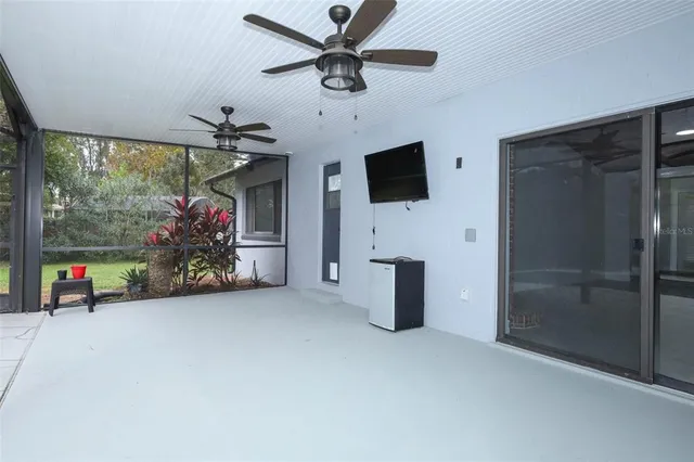 a view of a swimming pool with a porch