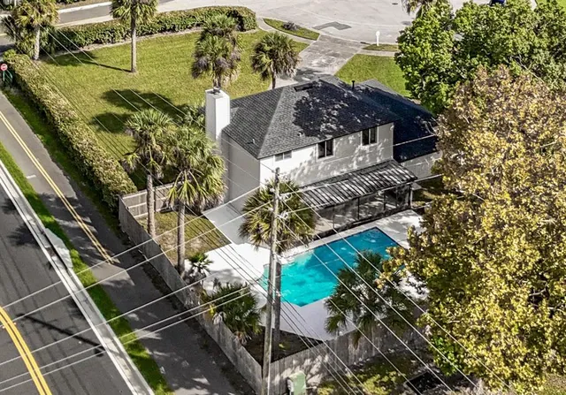 a view of a hallway view with staircase