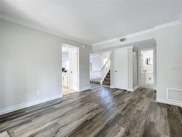 a bathroom with a double vanity sink and mirror