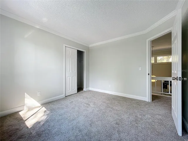 a house with swimming pool in front of it