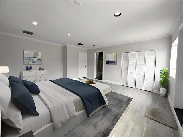 a dining room with a large window and wooden floor