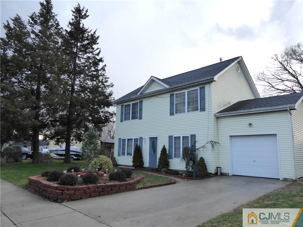 20 Miko Road Edison, NJ 08817 - Photo 2 of 19 a front view of a house with a garden