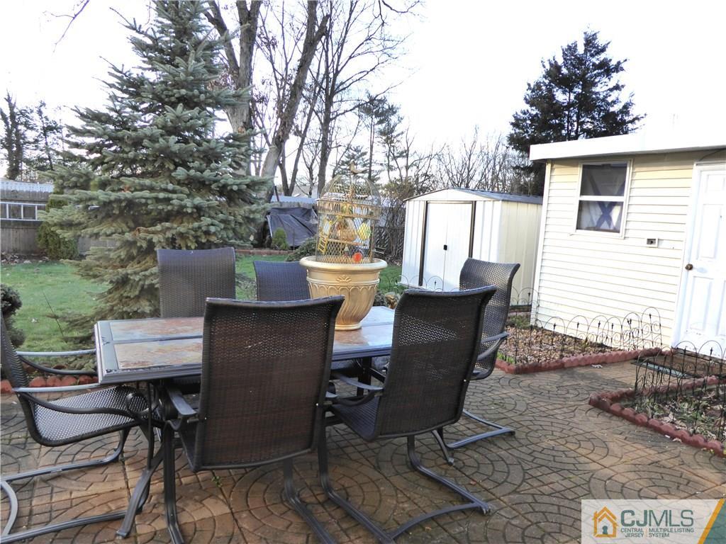 20 Miko Road Edison, NJ 08817 - Photo 19 of 19 a view of a patio with table and chairs