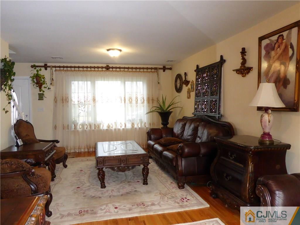 20 Miko Road Edison, NJ 08817 - Photo 5 of 19 a living room with furniture and a window